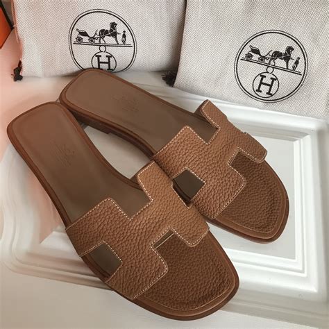 dames slippers hermes|Hermes slippers women price.